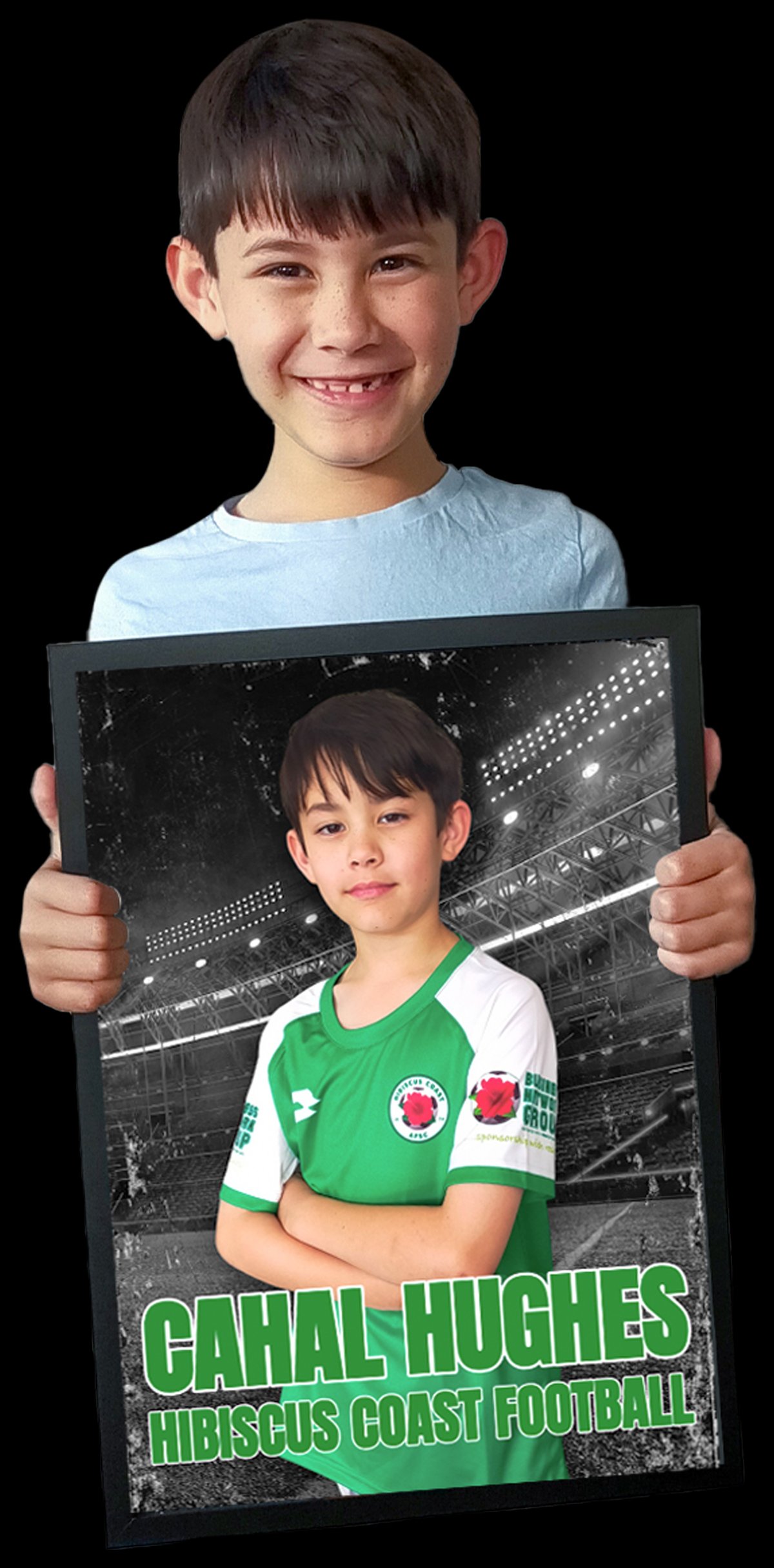 A smiling boy holding his personalized football poster